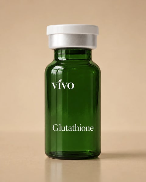 Vivo Glutathione injection — forest green glass vial with a silver collar and white cap, studio close-up