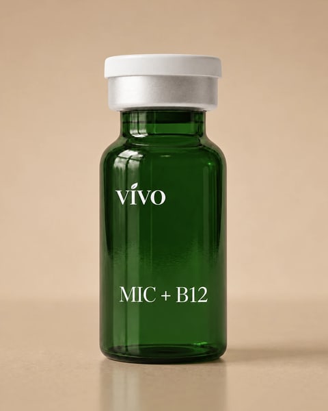 Vivo MIC+B12 — dark green glass vial with a silver band and white cap, studio close-up