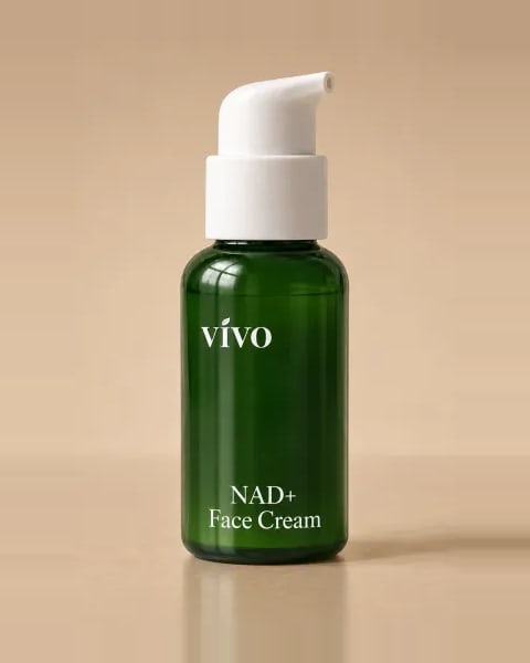 Vivo NAD+ Face Cream — forest green pump bottle, studio close-up