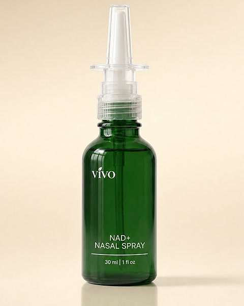 Vivo NAD+ Nasal Spray in a forest green glass bottle, studio photograph